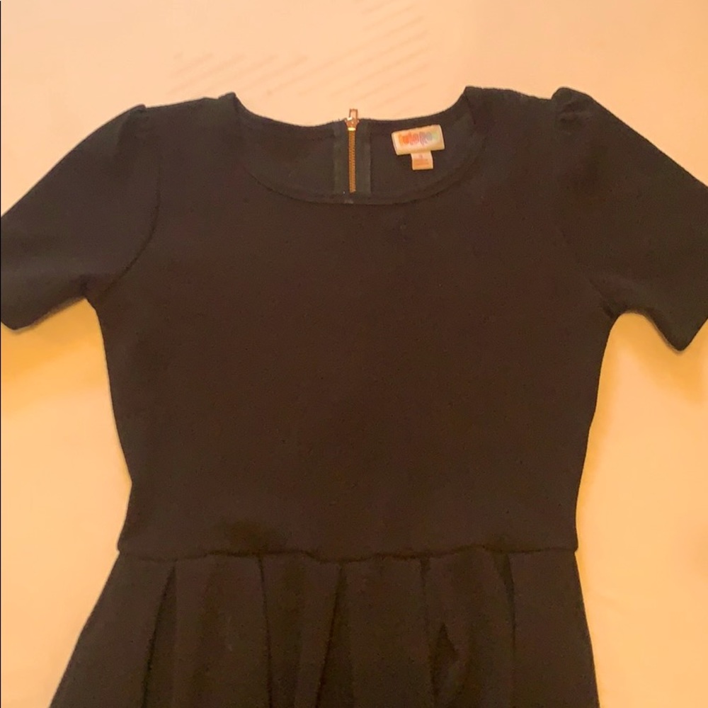 Solid black LulaRoe Amelia with rose gold zipper